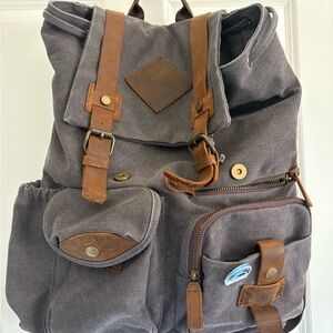 Gray Canvas Backpack with Brown Leather Accents